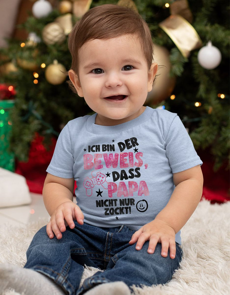 Baby / Kinder T-Shirt kurzarm Ich bin der Beweis, dass Papa nicht nur zockt rosa - von Mikalino