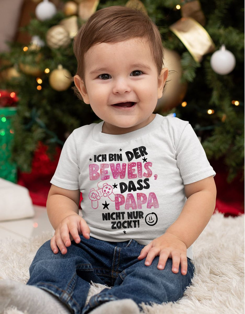 Baby / Kinder T-Shirt kurzarm Ich bin der Beweis, dass Papa nicht nur zockt rosa - von Mikalino